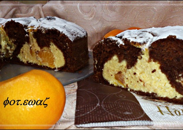 Fotografia przedstawiająca Ciasto kakaowo serowo mandarynkowe