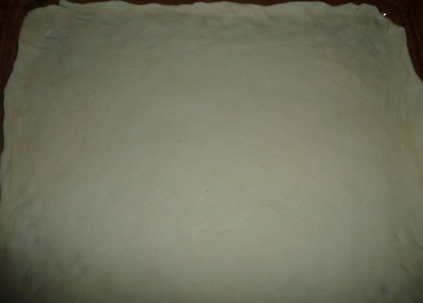 Fotografia przedstawiająca ciasto na pizze