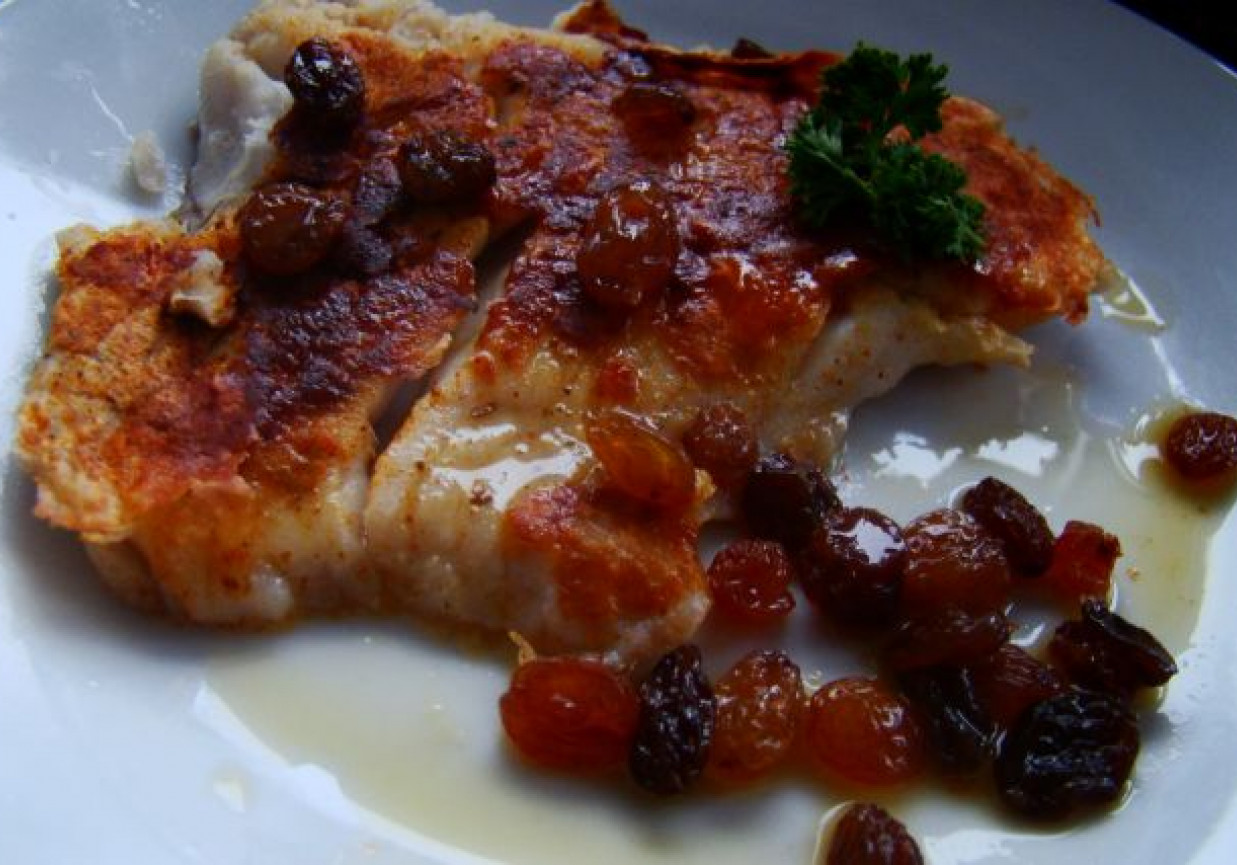 Dorsz w pomarańczach z rodzynkami foto