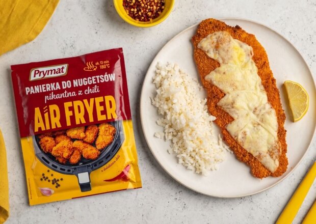 Fotografia przedstawiająca Filet z mintaja w panierce podwójnie zapieczony z serem