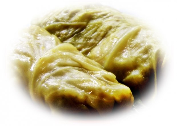 Fotografia przedstawiająca Gołąbki ziemniaczane w sosie grzybowym