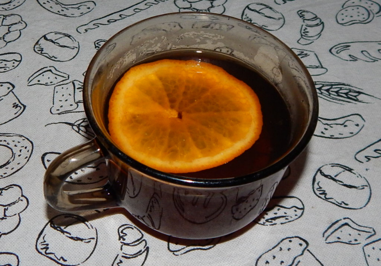 Herbata jesienna z pigwą, mandarynką i miodem foto