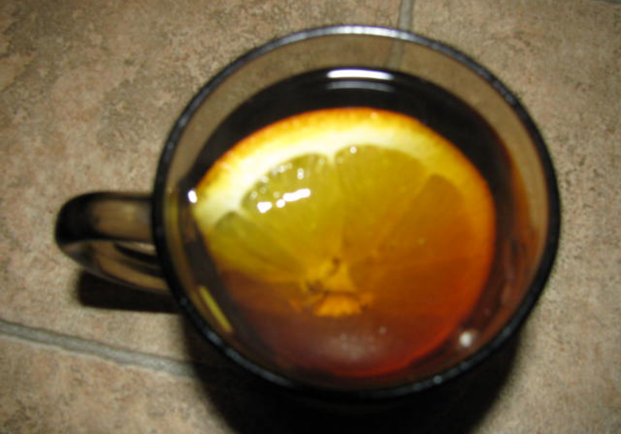 Herbata z pomarańczą i goździkami foto