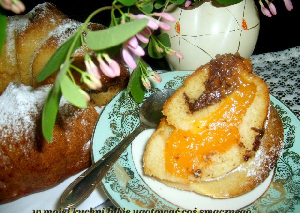 Fotografia przedstawiająca "kubusiowa" baba muffina z czekoladą...