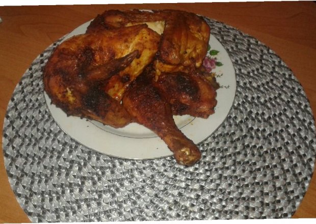 Fotografia przedstawiająca Kurczak z marynaty pieczony w piekarniku.