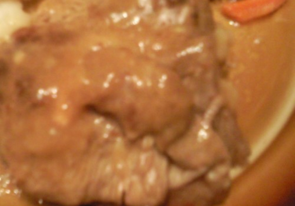 Mięso wieprzowe w sosie foto