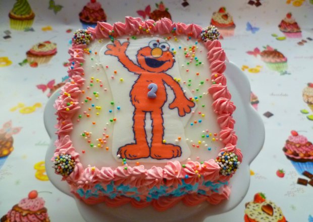 Fotografia przedstawiająca Mini torcik Elmo Urszulki  na przyjęcie dla lalek