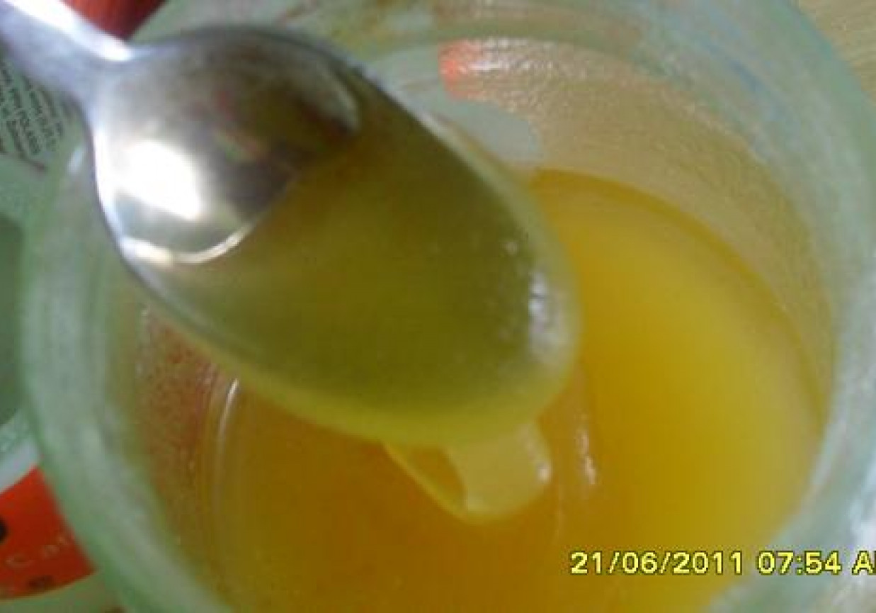 miód pitny z pomarańczą laską cynamonu i goździkami foto
