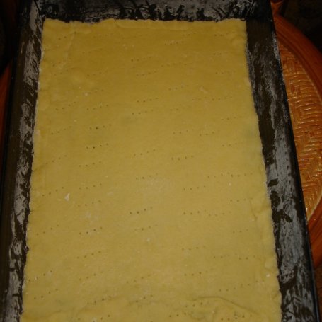 Krok 2 - Miodownik z masą serowo żurawinową i czekoladową pod kruszonką pistacjowo-dyniową foto