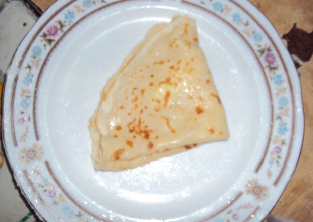 Fotografia przedstawiająca naleśniki z białym serem