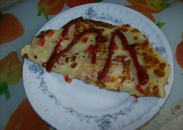 Fotografia przedstawiająca naleśniki z przyprawa do pizzy