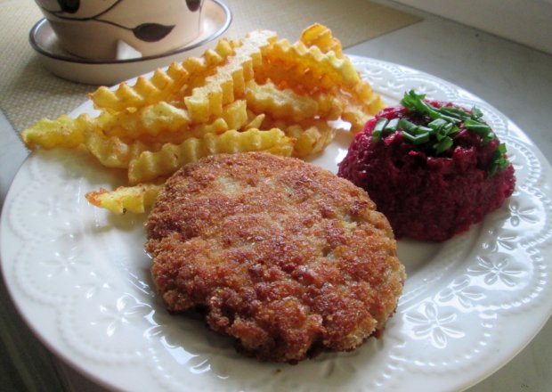 Fotografia przedstawiająca Niedzielny obiad polskiej rodziny