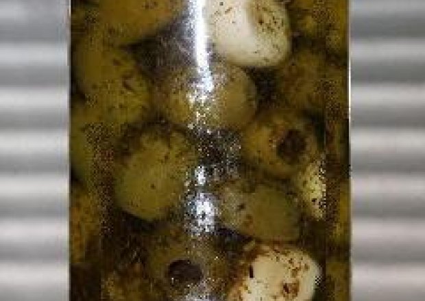 Fotografia przedstawiająca Oliwki w oliwie czosnkowo-ziołowej