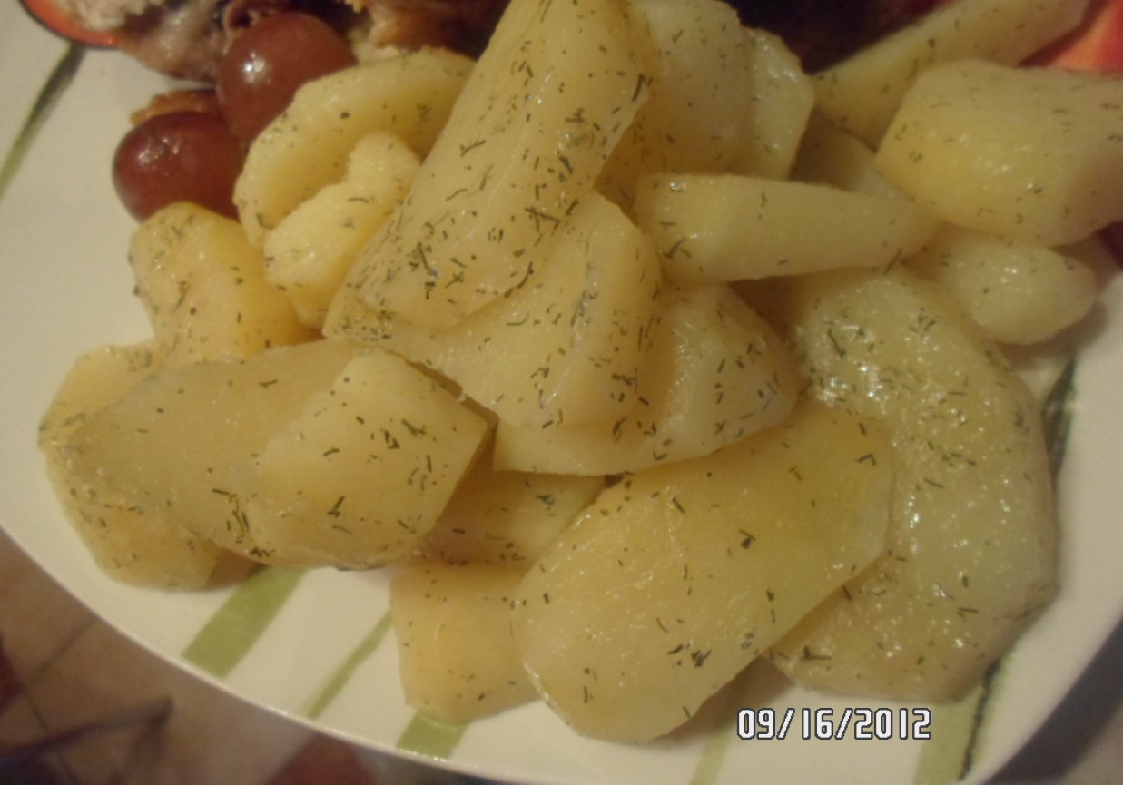 Opiekane ziemniaki z masłem foto