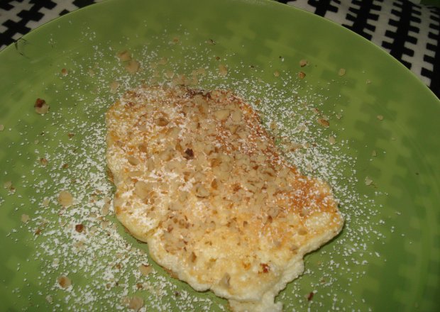 Fotografia przedstawiająca Pancakes Ricotta- w wersji z mielonymi orzechami lub konfiturą
