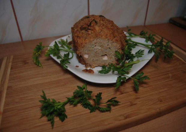Fotografia przedstawiająca Pieczeń z ryżem i kawałkami mięsa