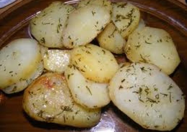 Fotografia przedstawiająca Pieczone ziemniaki w plastrach