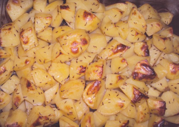 Fotografia przedstawiająca Pieczone ziemniaki z kminkiem