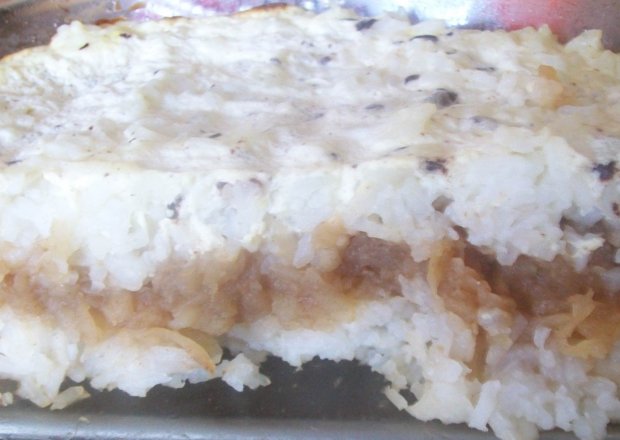 Fotografia przedstawiająca Pieczony ryż z jabłkami