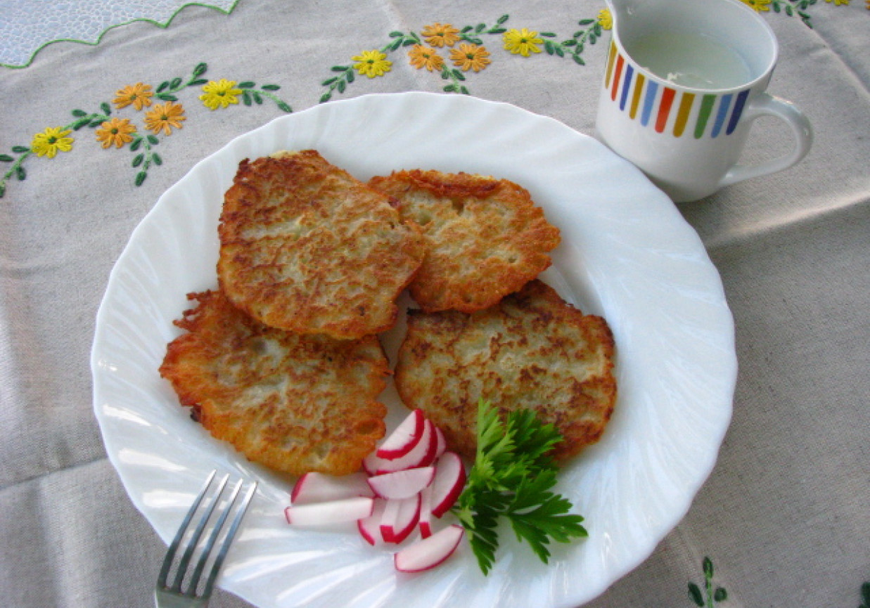 Placki ziemniaczane ze śmietaną i kminkiem foto