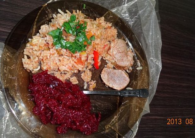 Fotografia przedstawiająca Polędwica wieprzowa z kurkami i ryżem