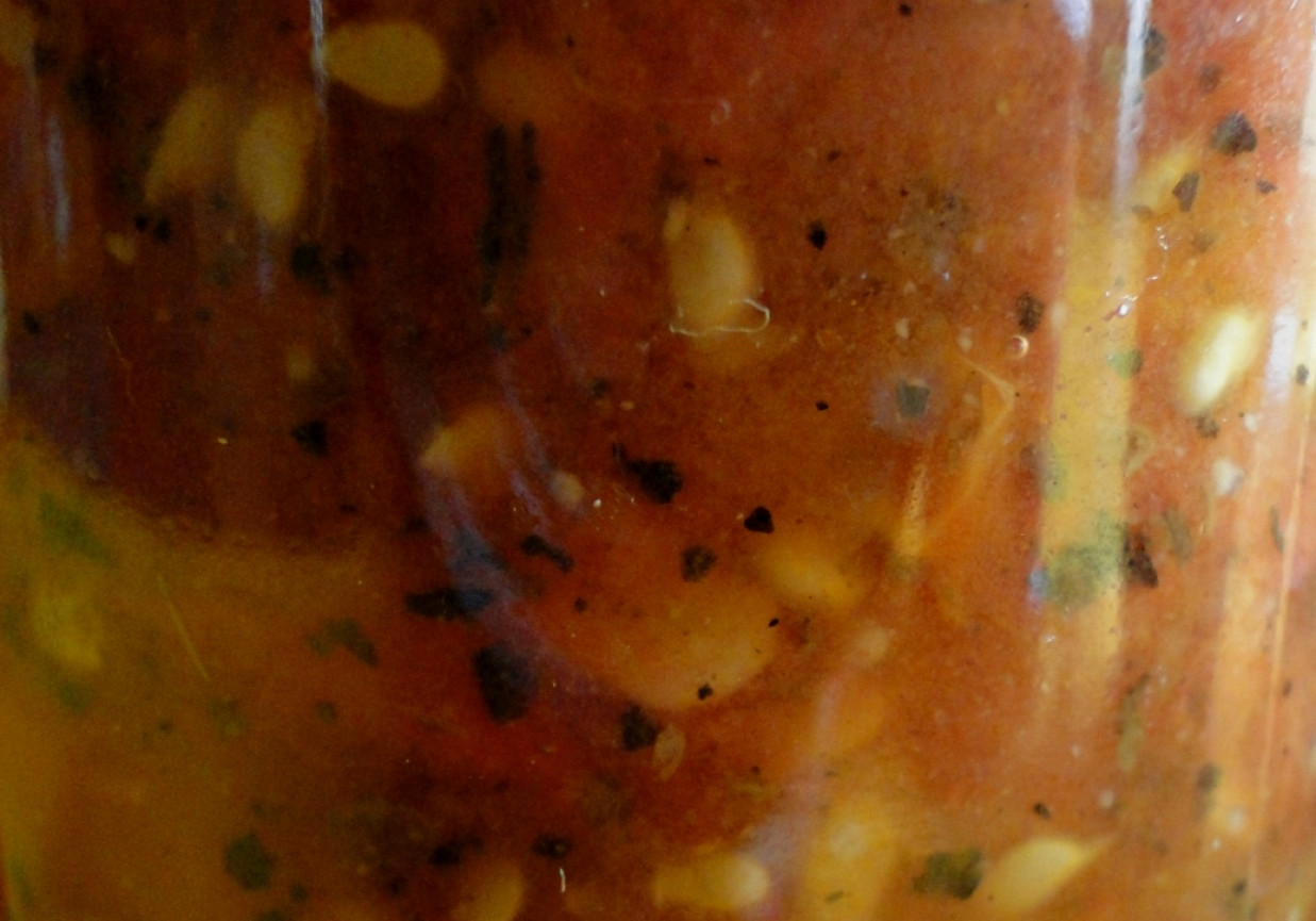 Pomidory krojone z czosnkiem i ziołami prowansalskimi foto