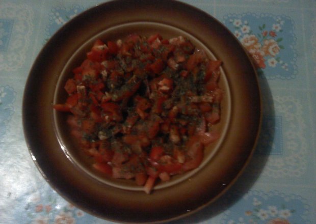 Fotografia przedstawiająca Pomidory w ziołach