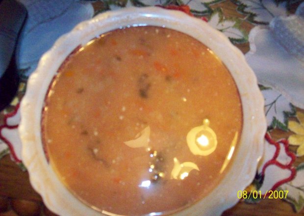 Fotografia przedstawiająca Prosta zupa pomidorowa zryżem