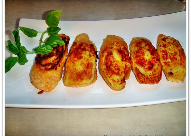 Fotografia przedstawiająca Rolowane ziemniaki w andrucie.