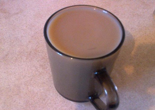 Fotografia przedstawiająca Rozgrzewająca kawusia z mlekiem