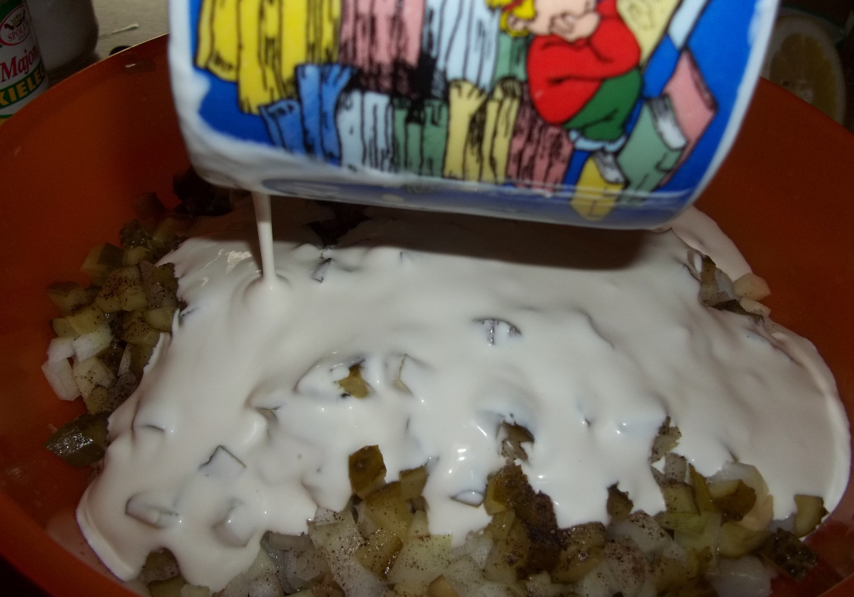 Śledzie w śmietanowo - majonezowym sosie foto