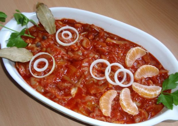 Fotografia przedstawiająca Sledzie z miodem  w pomidorach
