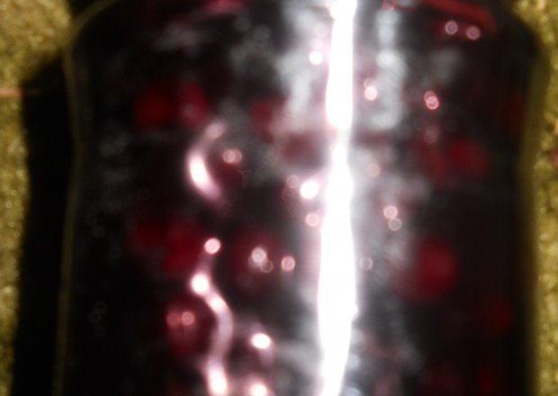Fotografia przedstawiająca sok jagodowy z miętą