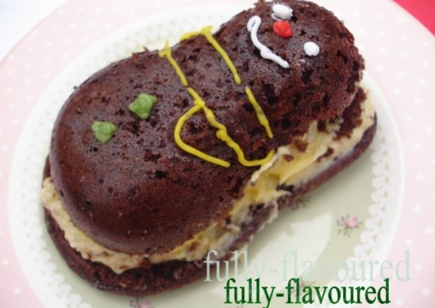 Fotografia przedstawiająca Tort czekoladowy z masą z kiwi i mango