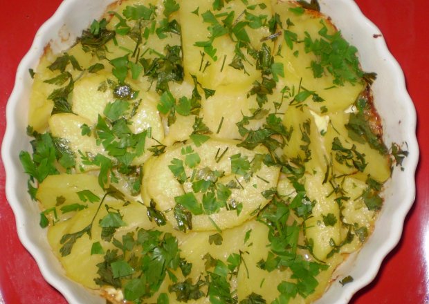 Fotografia przedstawiająca Zapiekane ziemniaki z oliwą truflową :