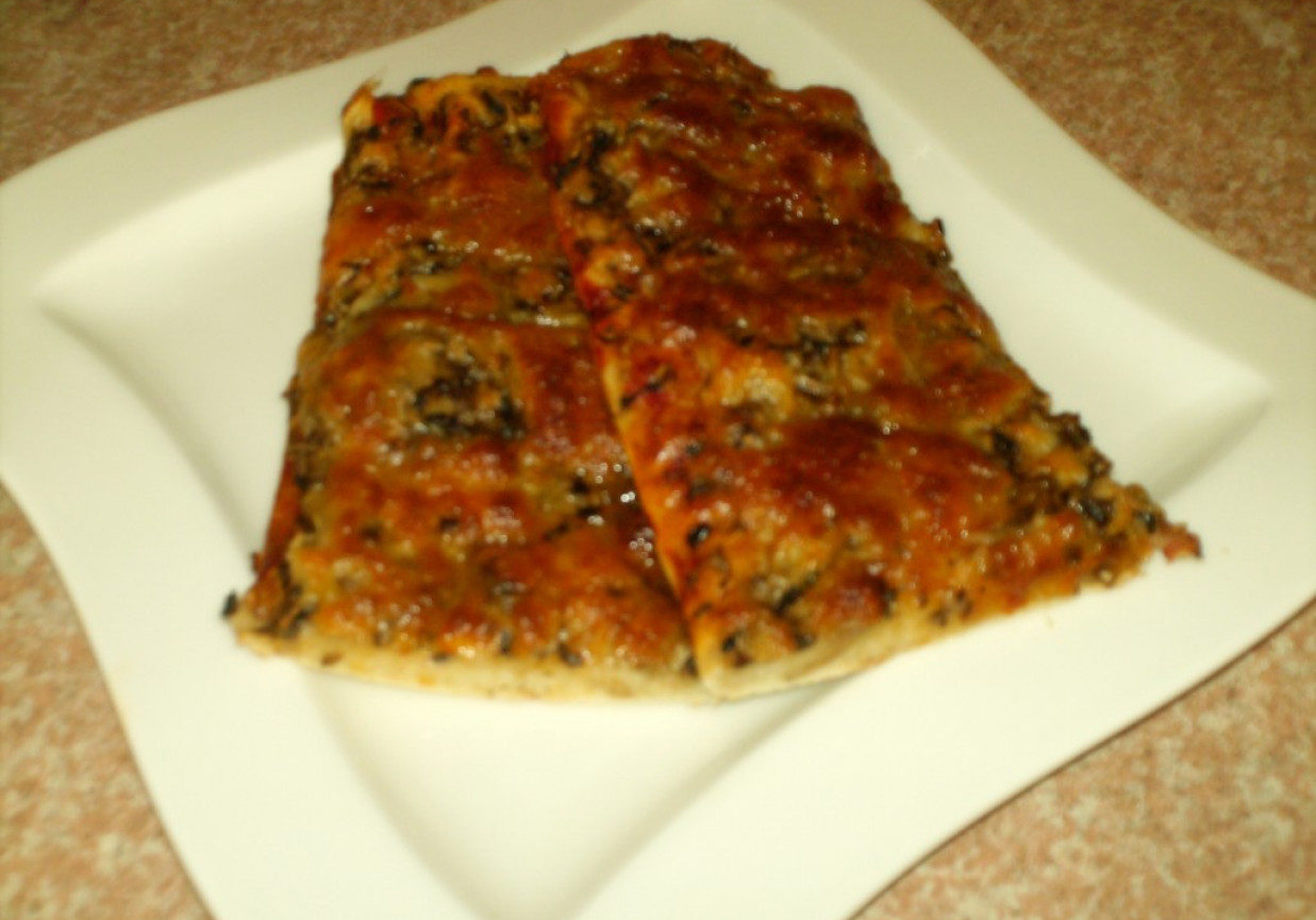 Zapiekanka z mozarellą oraz pieczarakmi foto