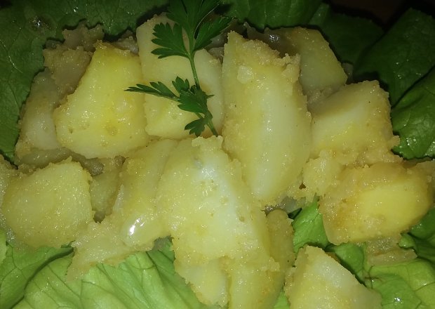 Fotografia przedstawiająca Ziemniaki smażone z cebulą