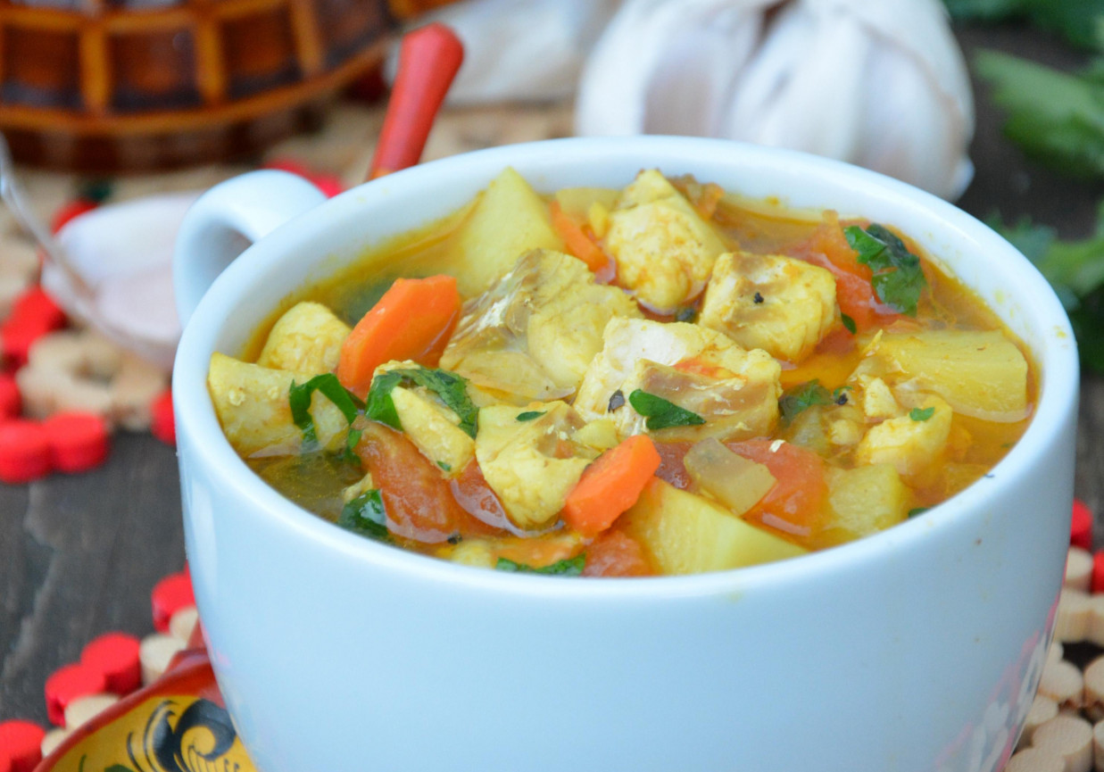 Zupa rybna curry z imbirem foto